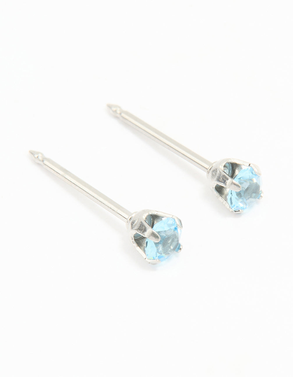 Showcasing surgical stainless steel 3MM blue cubic zirconia piercing stud featuring sky blue stones with stud closure in silver front view