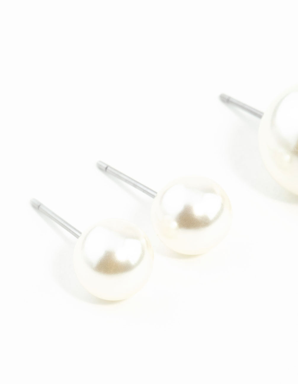 Designed with pearl these stud earrings in a 2-pack in white close up view