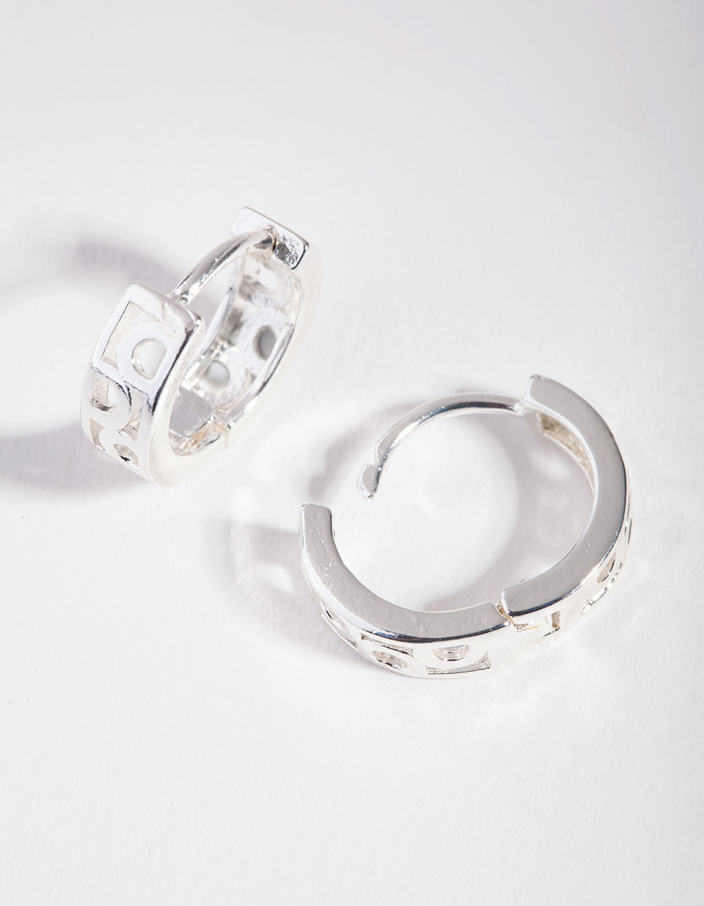Silver Circle Cutout Huggie Earings