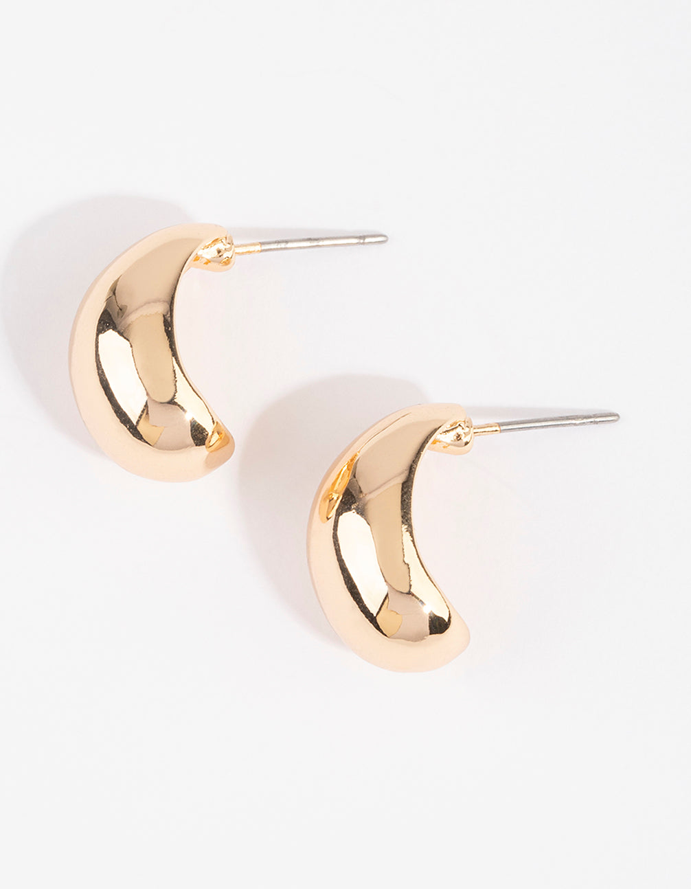 Stunning gold chubby huggie earrings in a chunky style front view