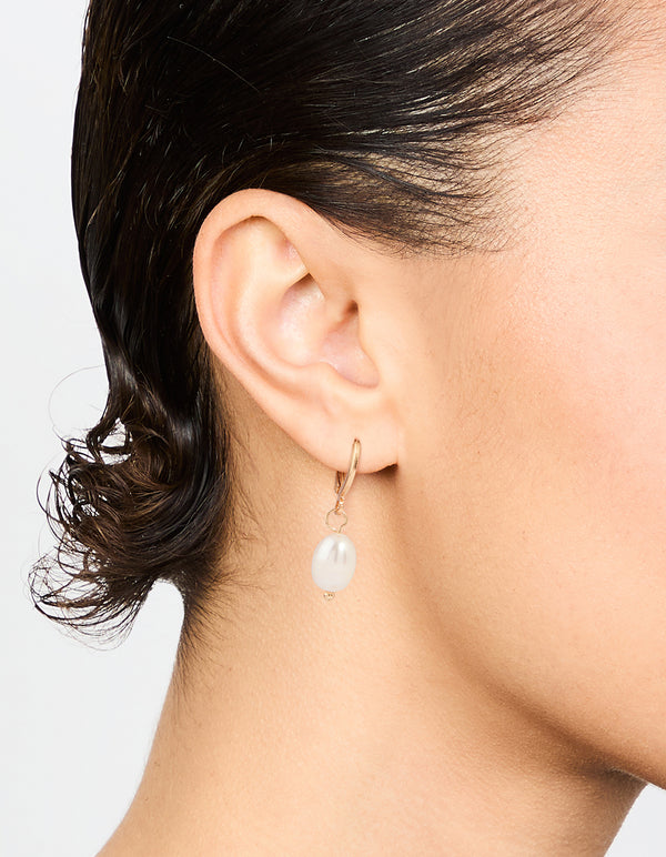 Gold Pearl Huggie Earrings