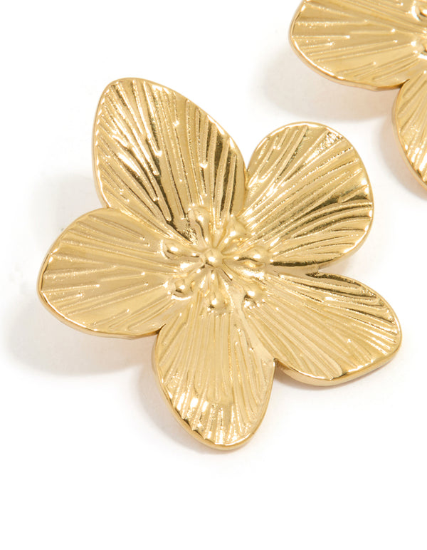 Designed with waterproof gold plated stainless steel, featuring textured flower pattern and floral details in close up view