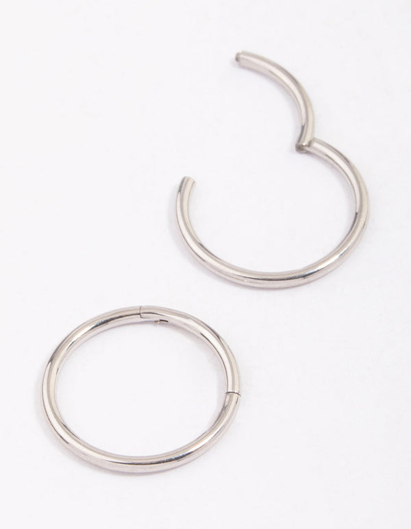 Explore dainty hoop closure earrings crafted from surgical steel in silver close up view