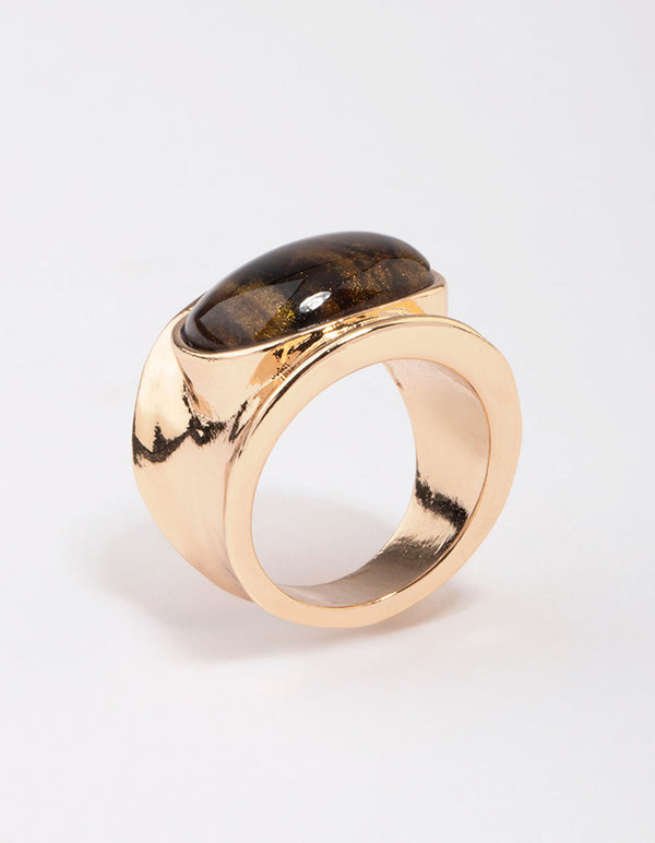 Featuring a tortoiseshell pattern statement chunky stone band ring in gold front view