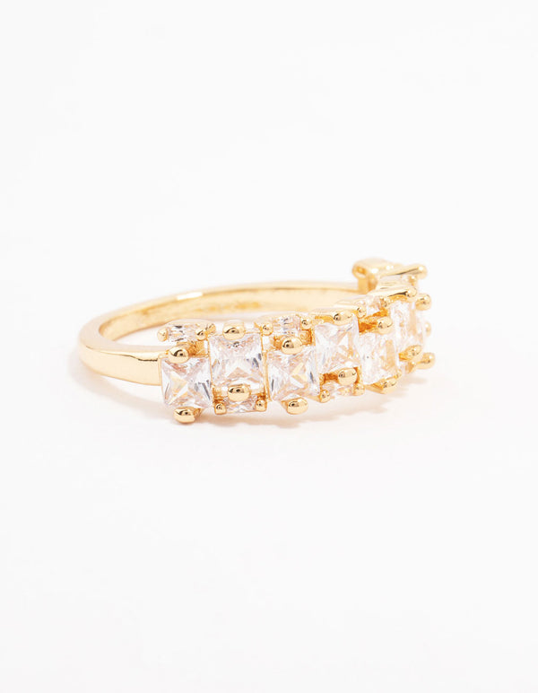 Showcasing a gold plated staggered cubic zirconia band ring with dainty design side detail view