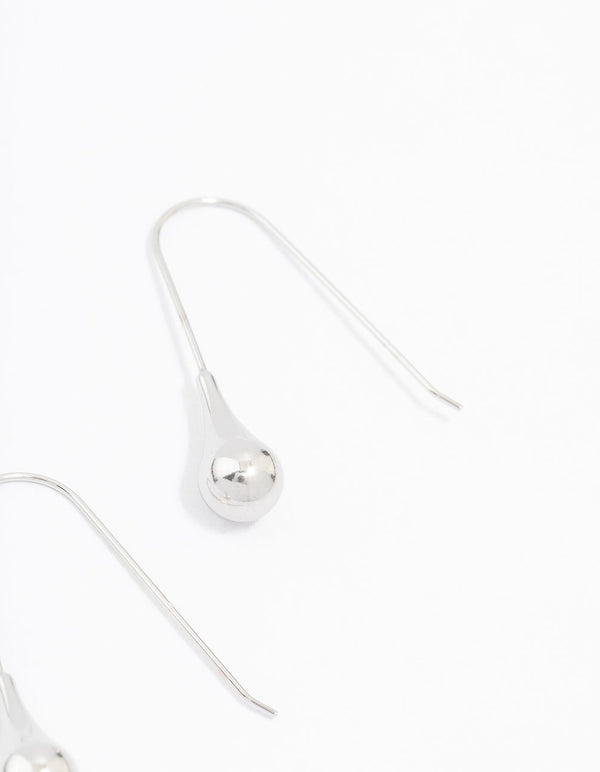 Elegant waterproof stainless steel thread through earrings with ball detail in silver post detail view