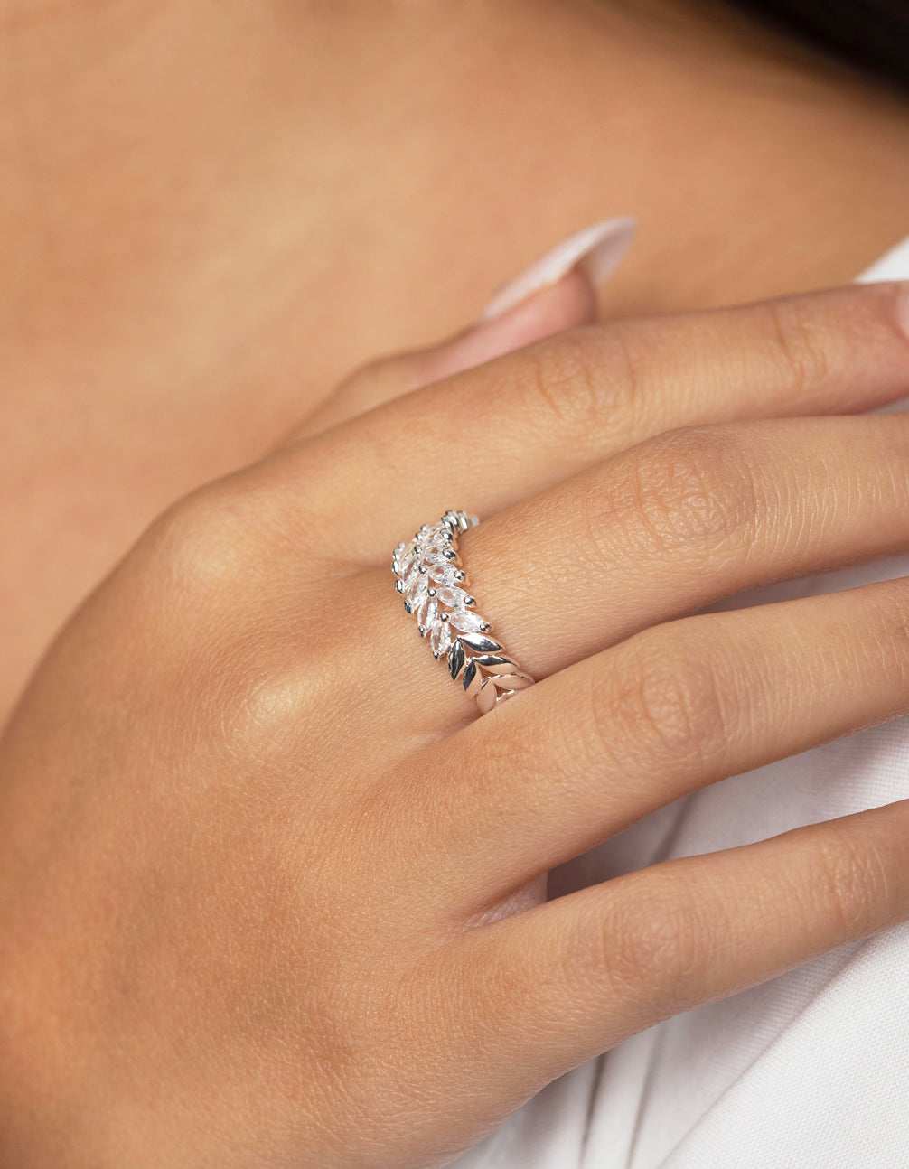 Elegant silver plated cubic zirconia navette ring on finger view