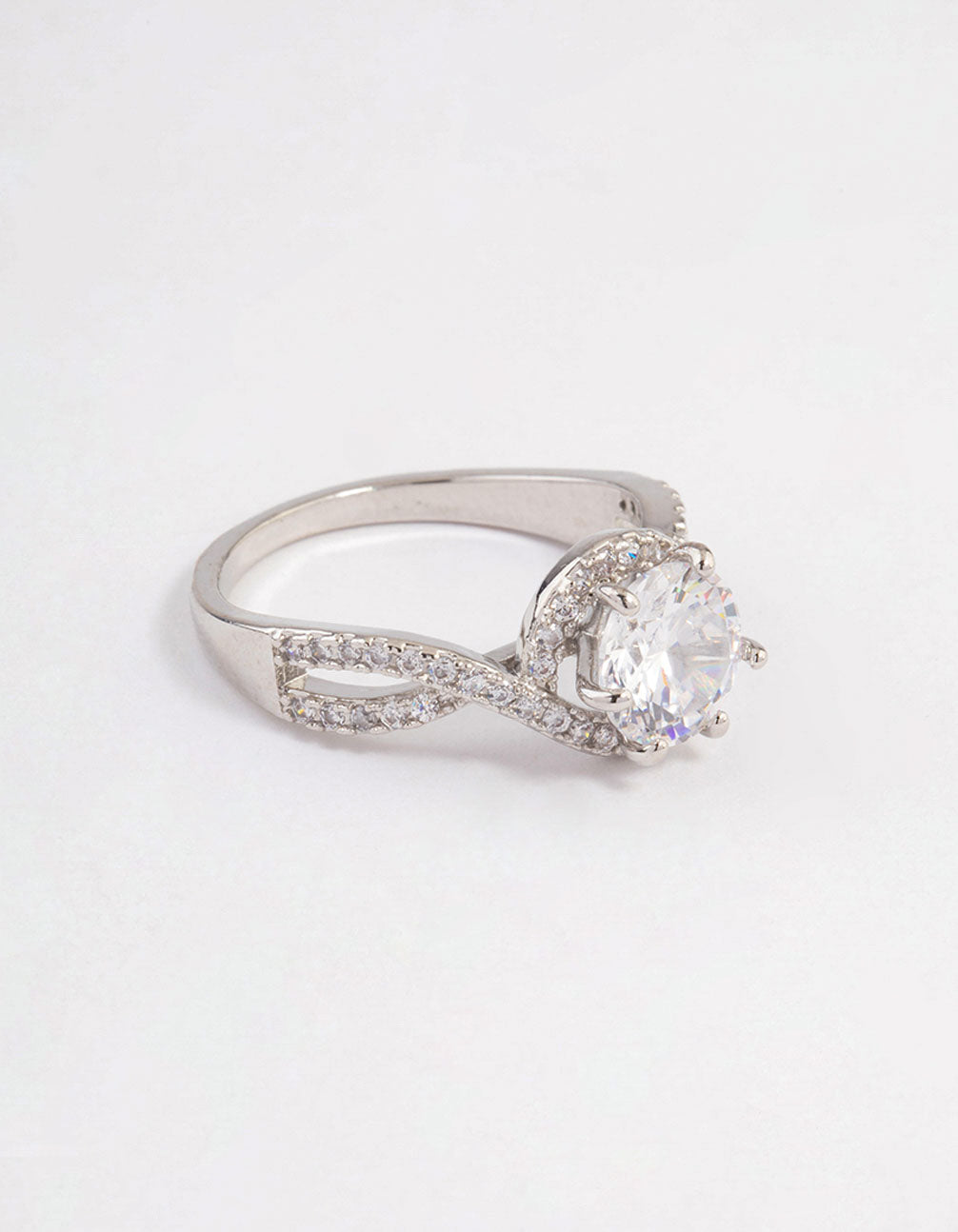 Beautifully crafted infinity halo ring with round crystal in silver side detail view