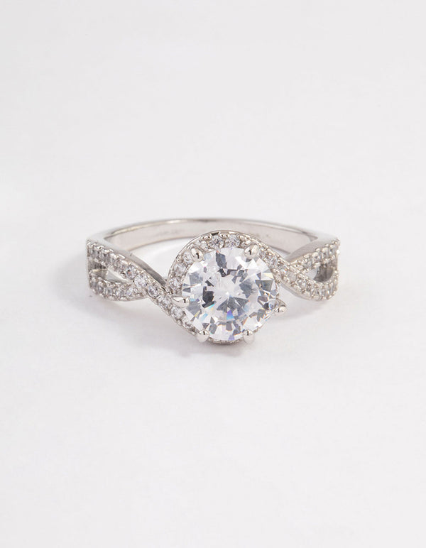 Elegantly designed round infinity halo ring featuring crystal in silver close up view