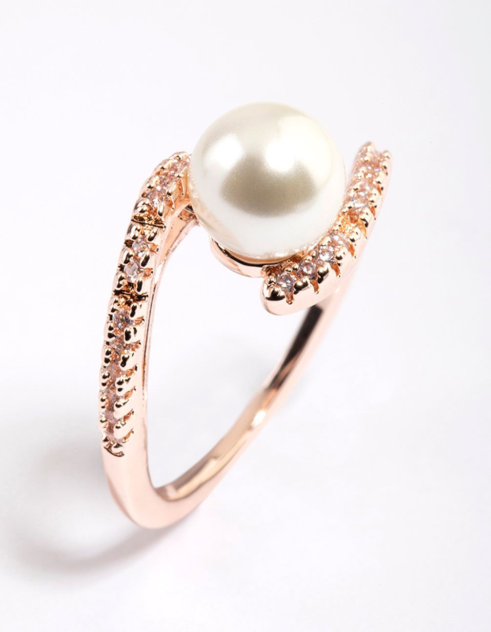 Featuring a rose gold plated wrapped pearl ring with dainty design side detail view