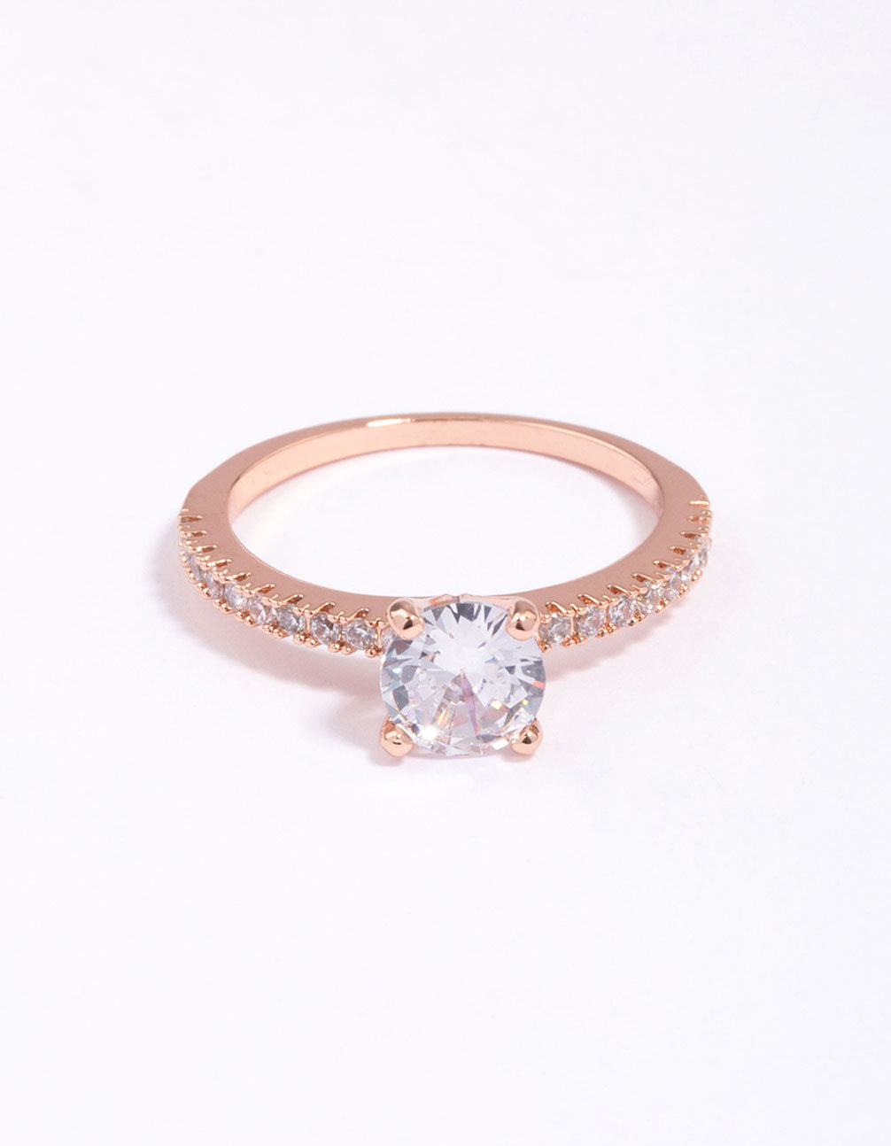 Beautifully crafted rose gold plated cubic zirconia ring featuring round cut stones with textured band design close up view