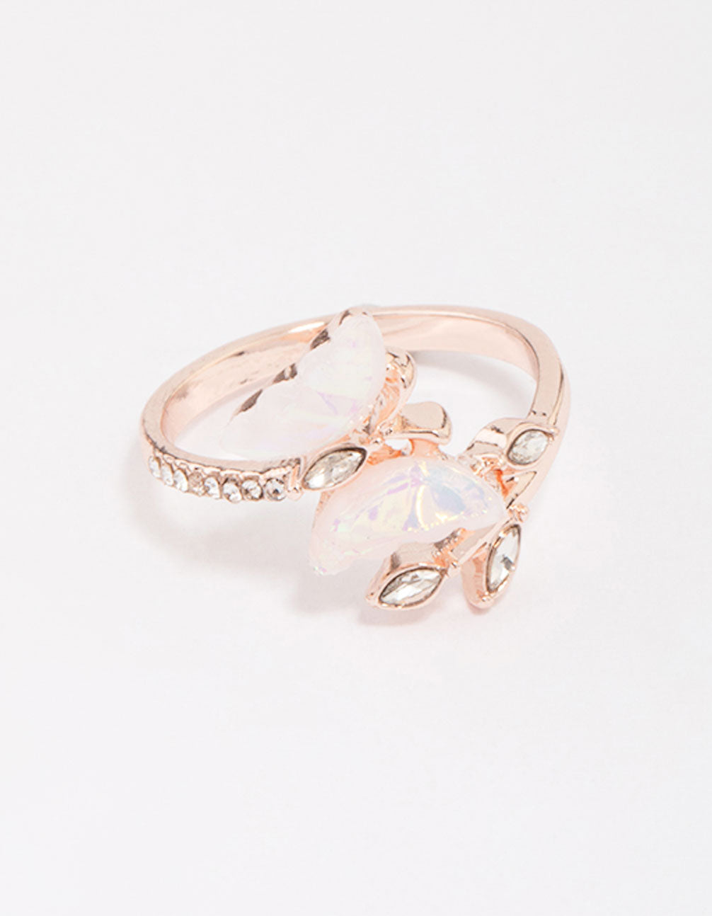 Featuring a dainty rose gold butterfly wrap ring side detail view