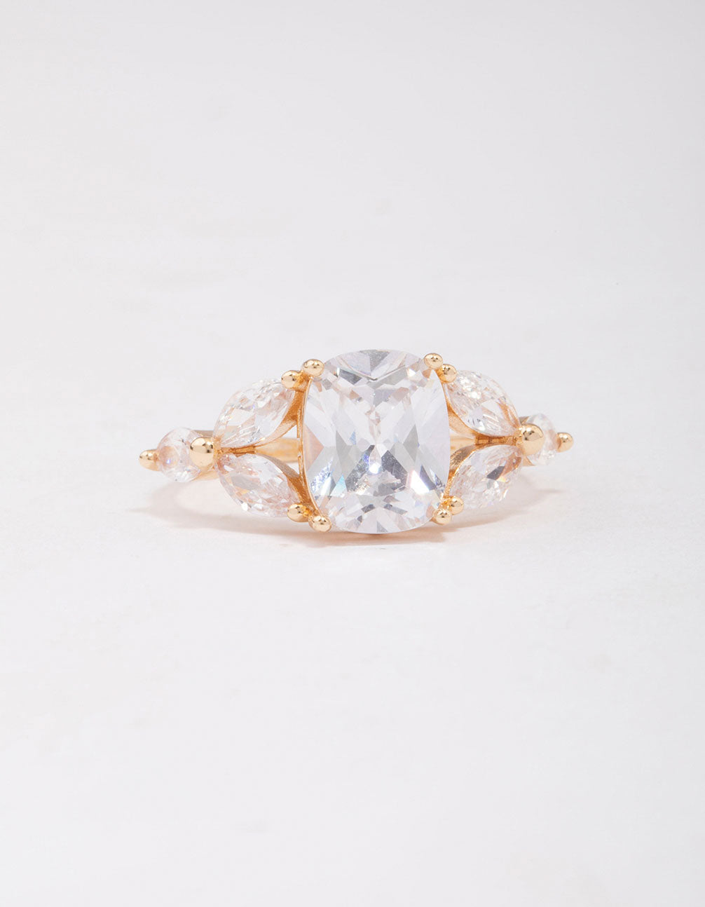 Highlighting a gold elegant floral cubic zirconia ring crafted with dainty details close up view