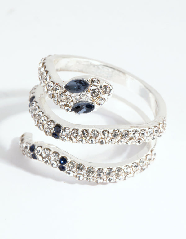 Stunning silver diamante blue-eyed snake ring featuring navy stone accents close up view