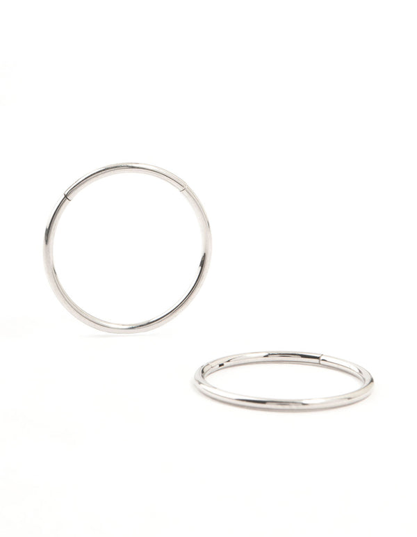 Discover these 14 mm surgical steel sleeper earrings in silver front view