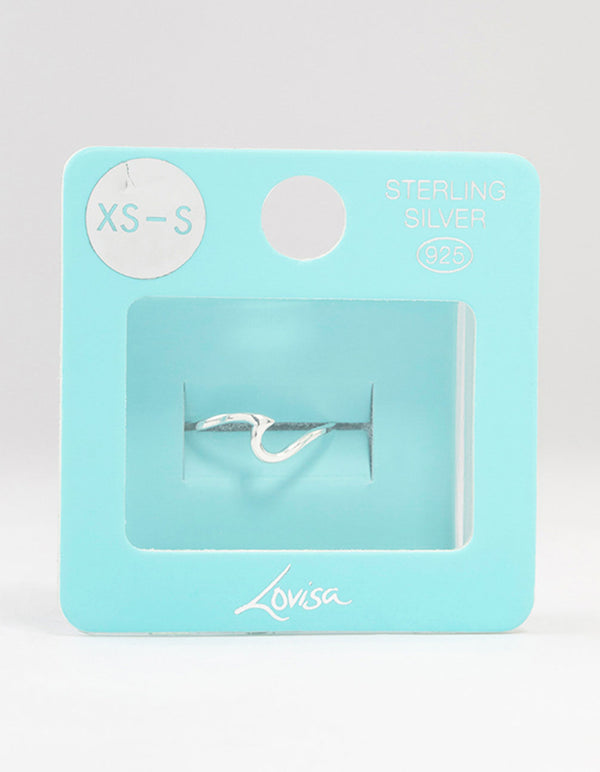 Showcasing a sterling silver wave ring close up view