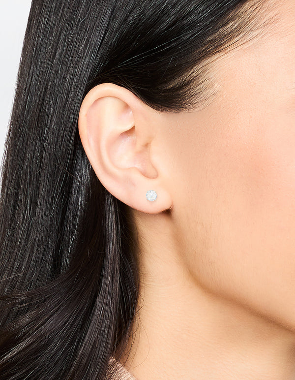 Elegant waterproof stainless steel cubic zirconia stud earrings 5MM in silver featuring crystal on ear view