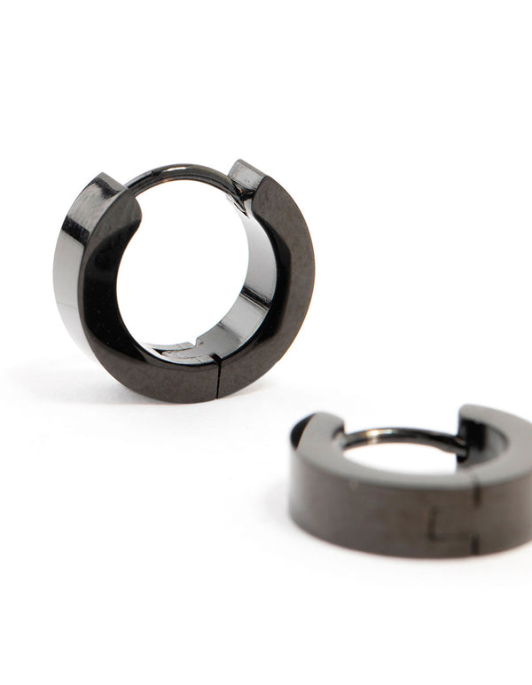 Designed with waterproof black coated stainless steel wide huggie earrings in close up view