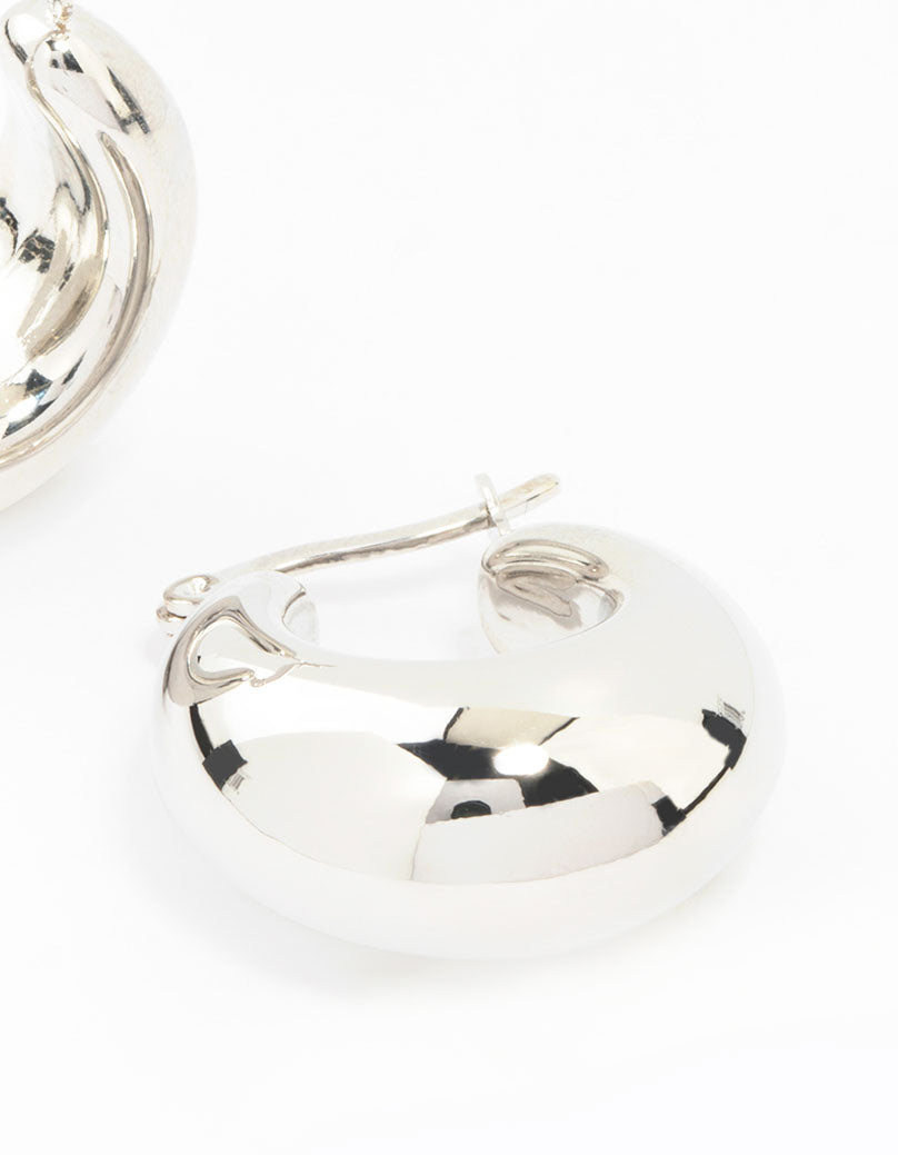 Showcasing waterproof stainless steel full bubble hoop earrings with secure closure in silver post detail view