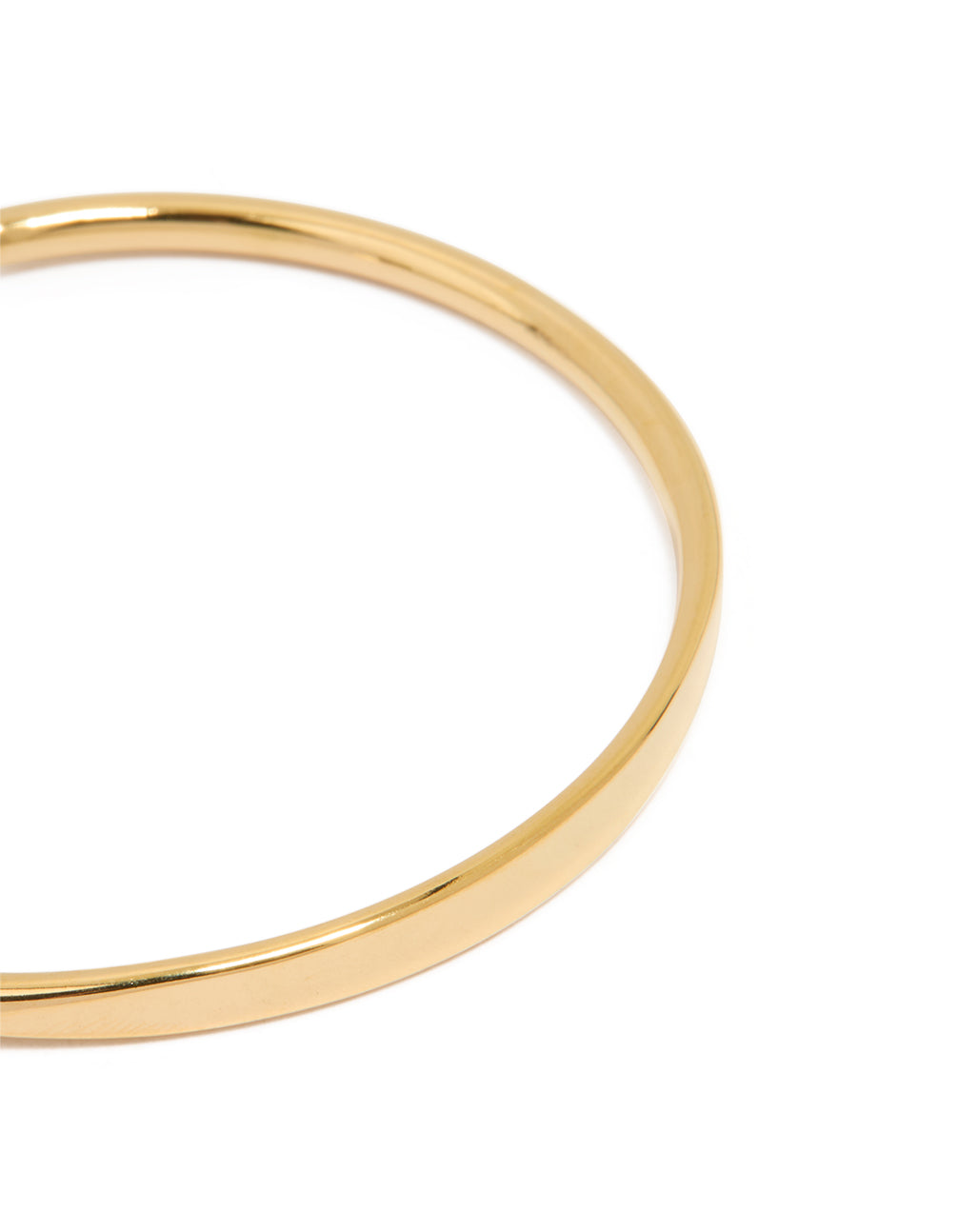 Crafted from waterproof gold plated stainless steel, this slim wrist cuff bangle in gold close up view