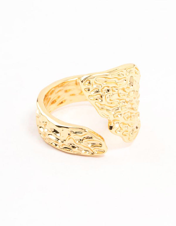 Showcasing a gold plated textured metal wrap ring with intricate detailing side detail view