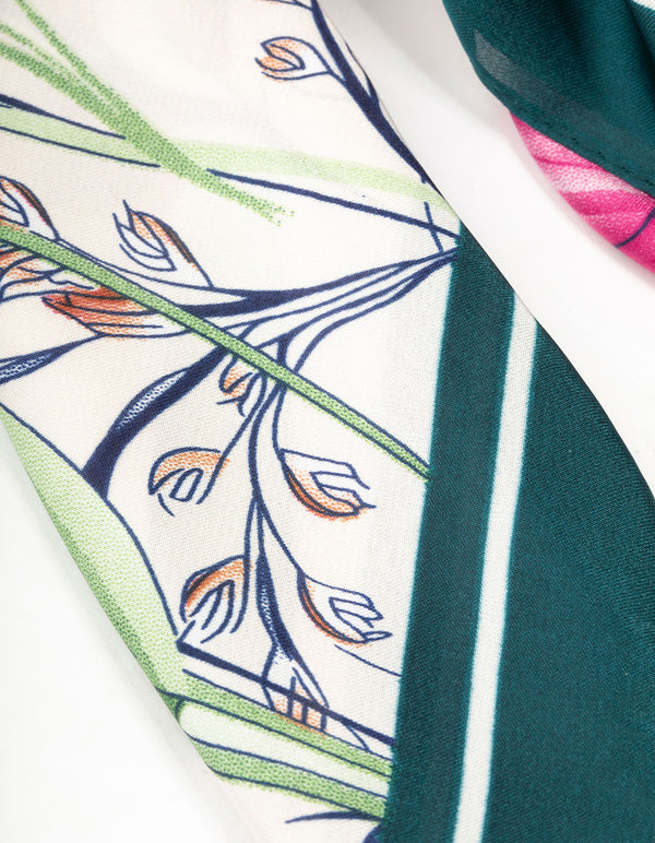 Crafted with multicoloured orchid scarf featuring leaf and floral print in teal, deep pink, olive drab, and orange design detail view