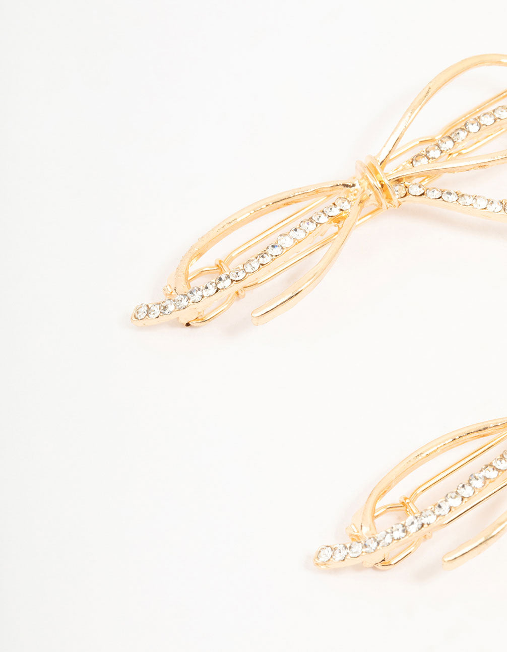 Showcasing bow and diamante detailing clips in a 2-pack detail view