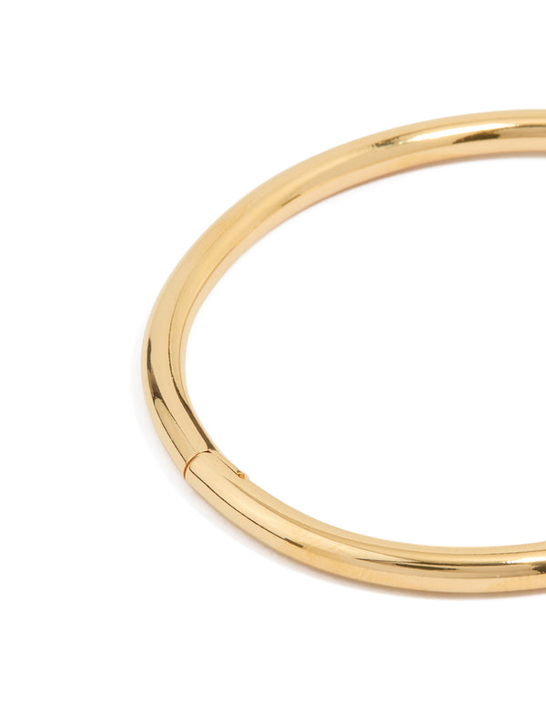 Designed with waterproof gold plated stainless steel, this simple hinge bracelet highlights closure detail view
