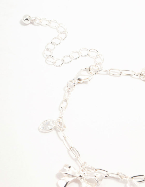 Silver Plated Alternating Cubic Zirconia & Bow Charm Bracelet