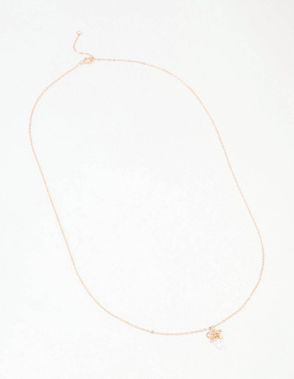 Rose Gold Plated Sterling Silver Bow And Pear Crystal Necklace