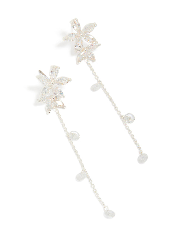 Elegantly crafted silver plated cubic zirconia flower station drop earrings featuring floral charm design front view