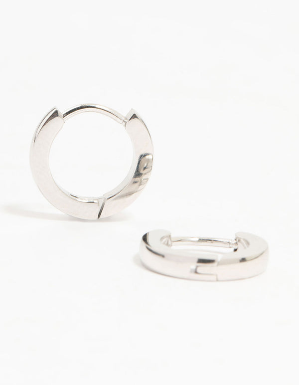Showcasing waterproof stainless steel thin clicker earrings with huggie closure in silver front view