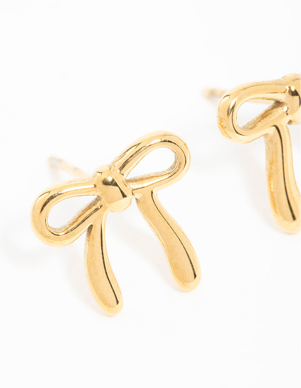 Presenting dainty bow stud earrings in waterproof gold plated stainless steel with enamel close up view