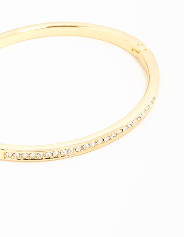 Elegant gold diamante hinged bangle close up view