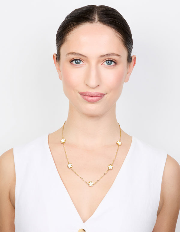 Featuring a waterproof gold plated stainless steel shell petal flower pendant necklace in floral and dainty style on model view