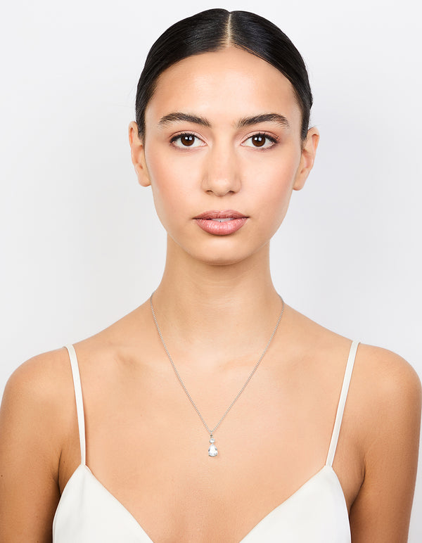Featured waterproof stainless steel cubic zirconia pear pendant necklace in silver and clear on model view