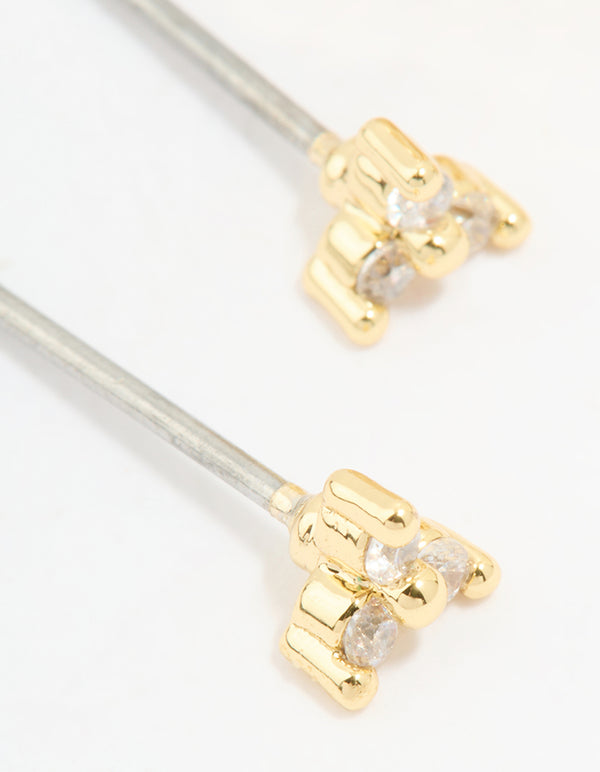 Highlighting gold plated cubic zirconia stud and huggie earrings in a 2-pack close up view