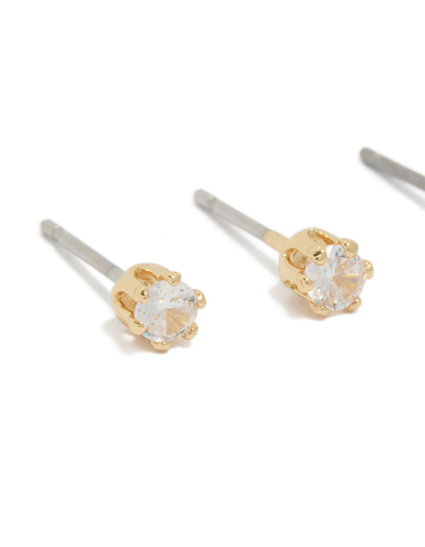 Featuring gold plated cubic zirconia stud earrings with accents in a 2-pack close up view