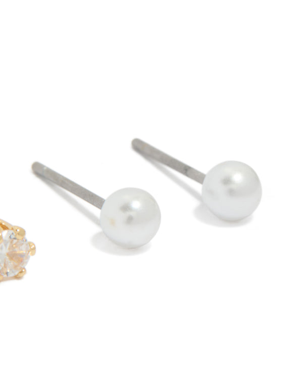 Crafted with pearl stud earrings and charm features in a 2-pack post detail view