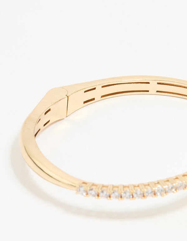 Sophisticated gold diamante hinge bangle featuring round cut stones closure detail view