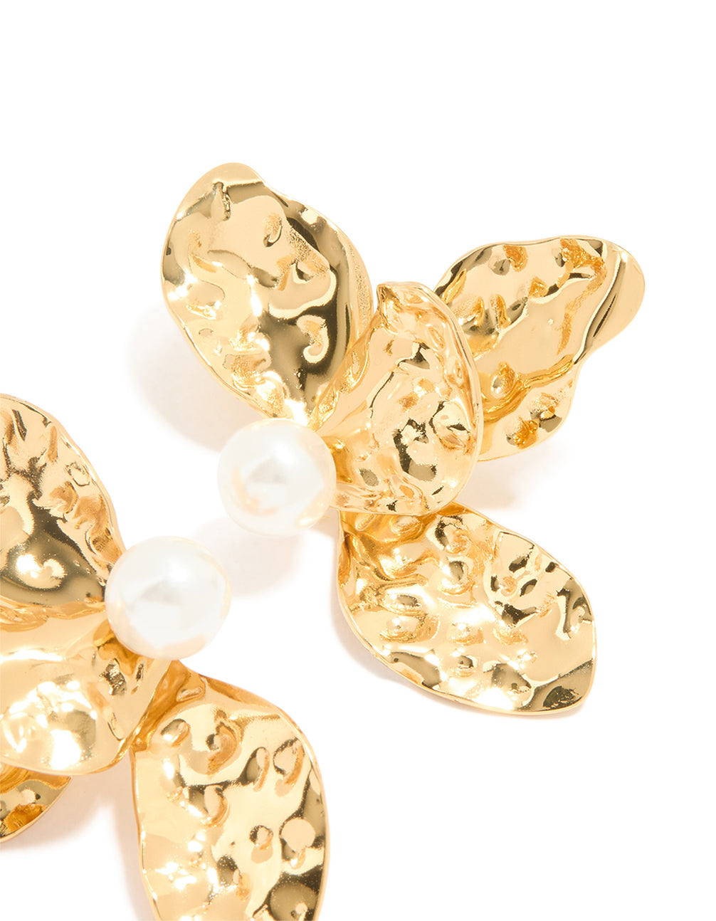 Highlighting waterproof large statement floral stud earrings with pearl centers, crafted from gold plated stainless steel in gold and white post detail view