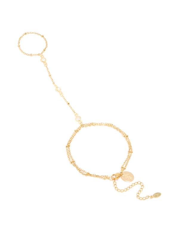 Showcasing a waterproof gold plated stainless steel hand chain with cubic zirconia with gold beads in dainty style front view