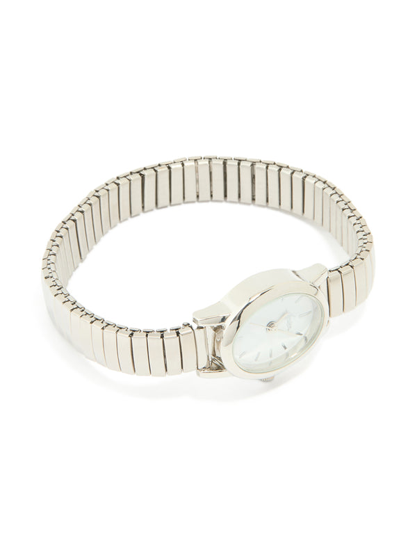 Stylish women's mini stretch watch with white dial, round shape, link band in silver, designed for casual occasions, analog type front view