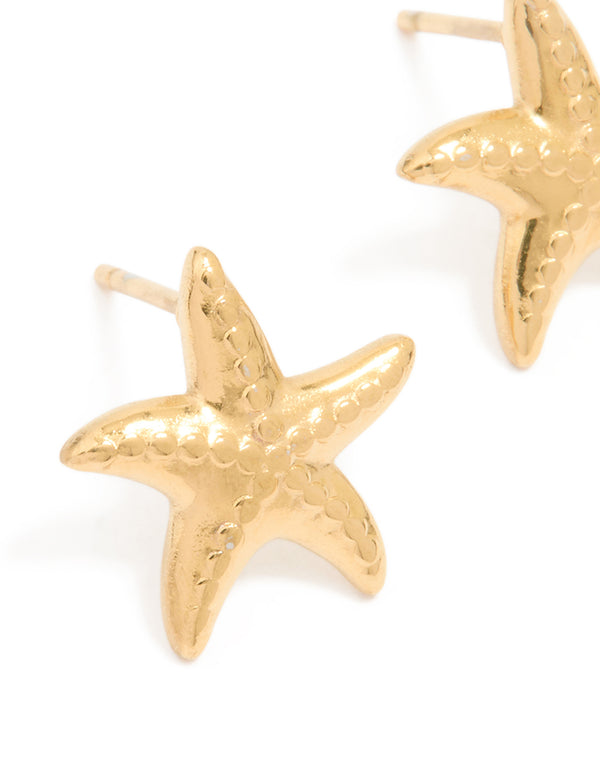 Designed with waterproof gold plated stainless steel textured starfish stud earrings featuring ocean-inspired detail close up view