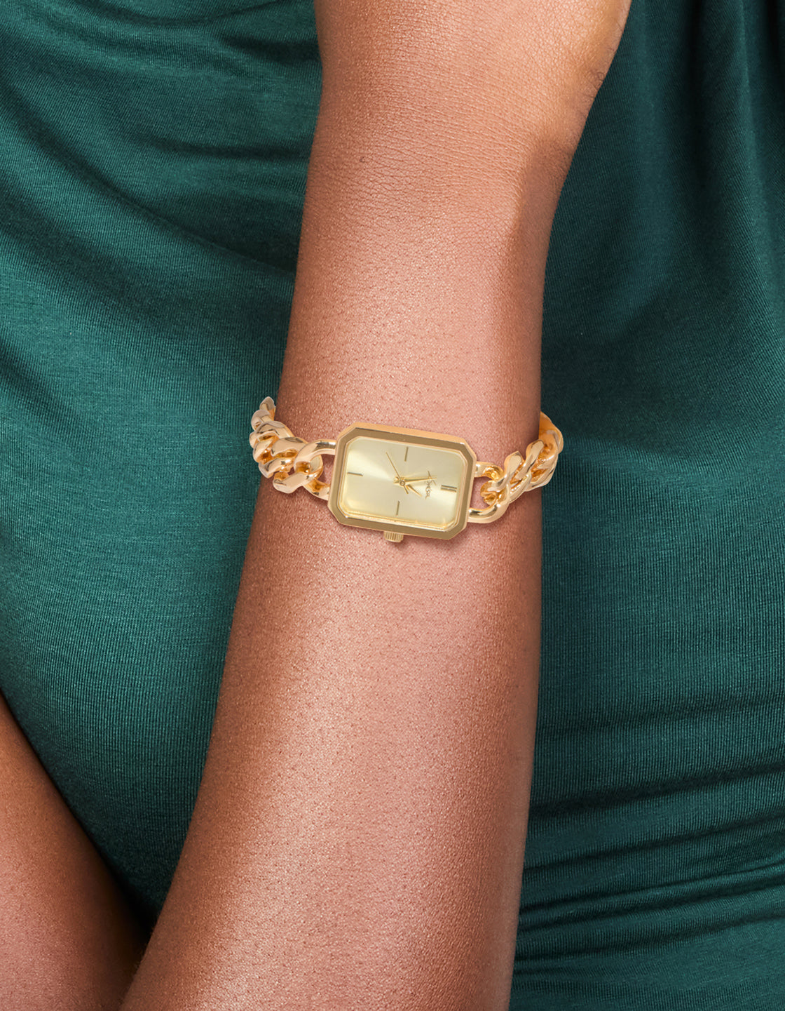 Elegant gold dial rectangle shaped women's casual link band analog watch in gold on wrist view