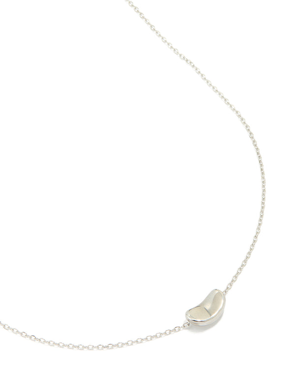 Crafted from silver plated material, this small pebble pendant necklace in a statement style front view