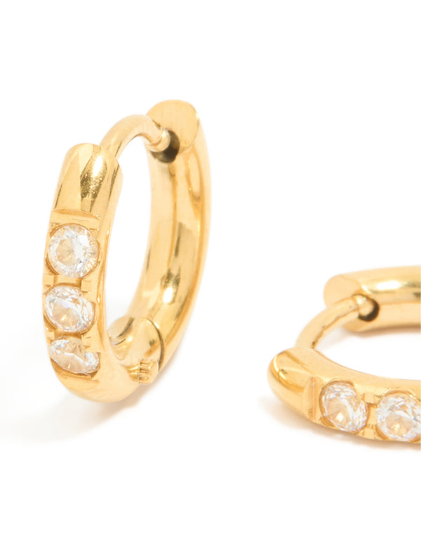 Designed with waterproof gold plated stainless steel and cubic zirconia huggie earrings close up view