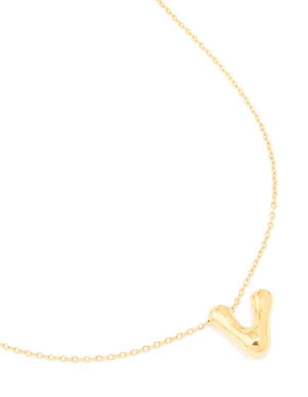 Featuring a waterproof gold plated stainless steel large bubble letter V initial pendant necklace close up view