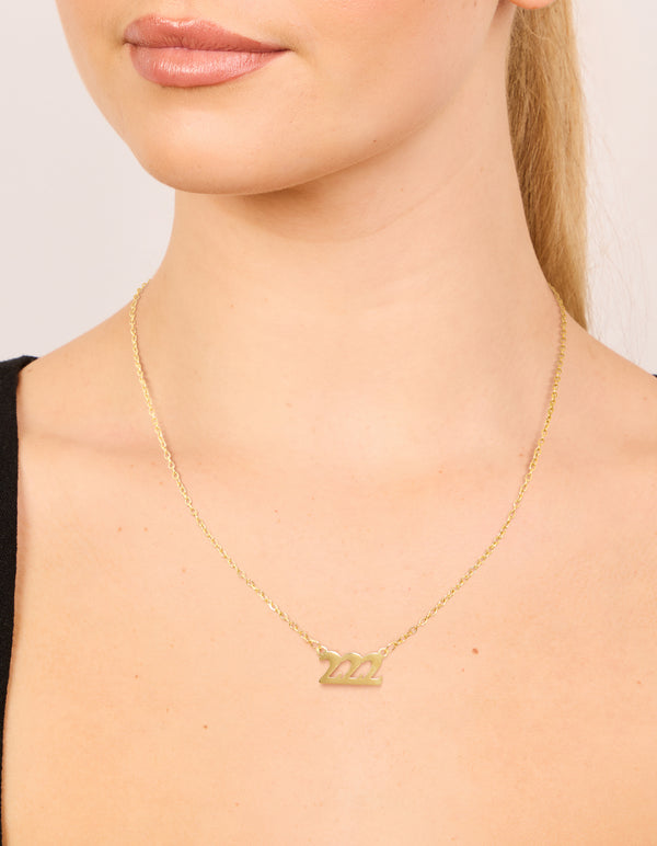 Featuring a waterproof gold plated stainless steel angel number 222 necklace on neck view