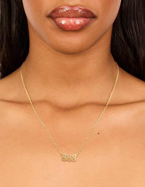 Featuring a waterproof gold plated stainless steel angel number 888 necklace with numbers detail on neck view